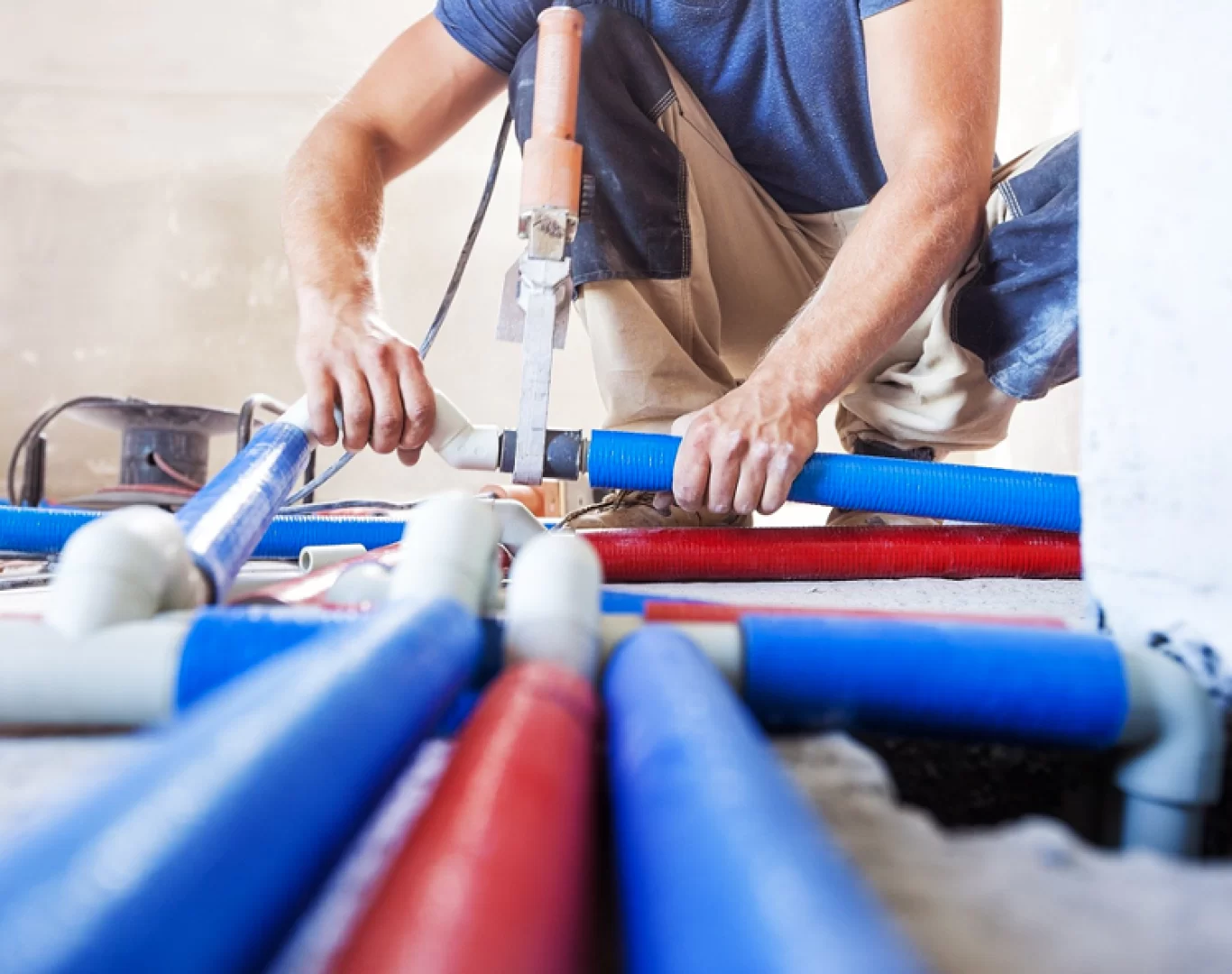 Plumber removing old galvanized pipes during a repipe in Oceanside, CA